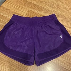 Purple athletic shorts